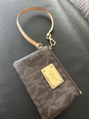 Michael Kors Brown and Tan Logo Wristlet with Gold Plate